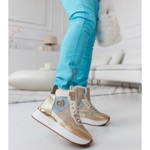 Złote ocieplane sneakersy z brokatem Deleon złoty. Żółte botki na zimę, bez wzorów, z okrągłym noskiem, przed kolano, bez obcasa, bez zapięcia. Za 169,07 zł.