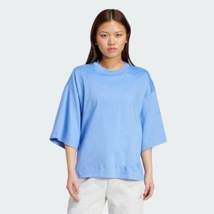 Luźna koszulka Soft Lux. Niebieskie bluzki ADIDAS, xs, bez wzorów, sportowe, bez kołnierzyka, bez ramiączek. Za 162,99 zł.