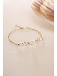 Lodie Silver Pozłacana bransoletka z elementem ozdobnym - dł. 17 cm rozmiar: onesize. Szare bransoletki Lodie Silver, z cyrkonią, pozłacane. Za 120,95 zł.