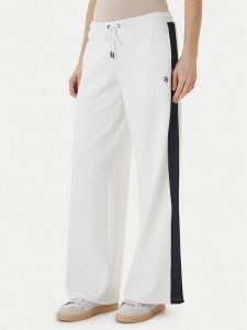 Guess Jeans Spodnie dresowe W6GBB6 KB212 Biały Relaxed Fit. Białe spodnie dresowe Guess Jeans, xl, z aplikacjami, z dresówki. Za 434,99 zł.