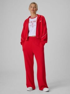 4F Spodnie dresowe z szerokimi nogawkami damskie - czerwone XL. Czerwone spodnie dresowe 4f, l, bez wzorów, z dresówki. Za 159,99 zł.
