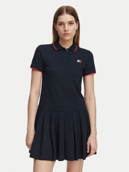 Tommy Jeans Sukienka codzienna Tommy Badge DW0DW22328 Granatowy Relaxed Fit. Niebieskie kombinezony Tommy Jeans, s, bez wzorów, z bawełny, bez kołnierzyka, bez ramiączek. Za 265,99 zł.