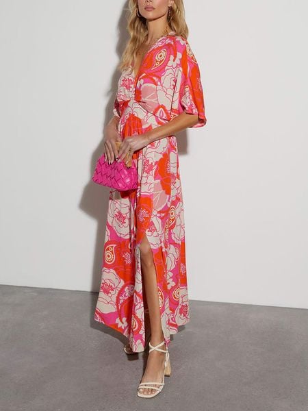 Milan Kiss Sukienka w kolorze pomarańczowo-kremowym rozmiar: S. Pomarańczowe sukienki Milan Kiss, s, bez wzorów, bez kołnierzyka, bez ramiączek, maxi. Za 152,62 zł.