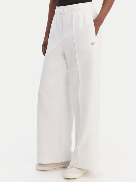 Lacoste Spodnie dresowe XF0041 Biały Relaxed Fit. Białe spodnie dresowe Lacoste, bez wzorów, z bawełny. Za 460,99 zł.