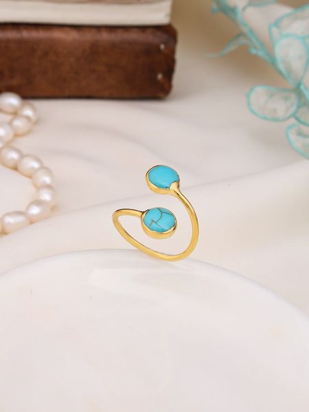 L'Atelier de Gaia Pozłacany pierścionek z turkusem rozmiar: onesize. Niebieskie pierścionki L'Atelier de Gaia, z turkusem, pozłacane. Za 91,34 zł.