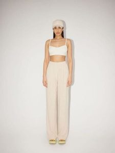 LeGer Spodnie "Thora" w kolorze beżowym rozmiar: 44. Brązowe spodnie z wysokim stanem LeGer, bez wzorów, z materiału, z podwyższonym stanem. Za 121,99 zł.