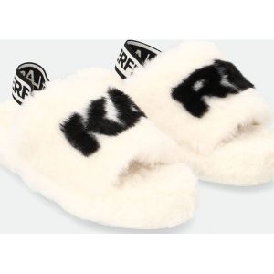 Klapki KARL LAGERFELD. Żółte klapki KARL LAGERFELD, bez wzorów, bez obcasa. Za 319,99 zł.