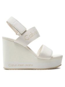 Calvin Klein Jeans Sandały Wedge Sandal Webbing In Mr YW0YW01360 Biały. Białe sandały Calvin Klein Jeans, bez wzorów, z jeansu, bez obcasa, na koturnie, bez zapięcia. Za 319,99 zł.