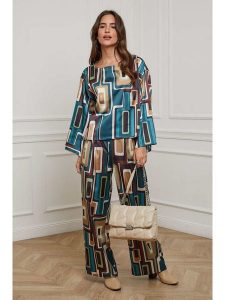 L'armoire de Suzette Bluzka w kolorze turkusowym rozmiar: 38/40. Niebieskie bluzki L'armoire de Suzette, l, bez wzorów, klasyczne, bez kołnierzyka, bez ramiączek. Za 69,99 zł.