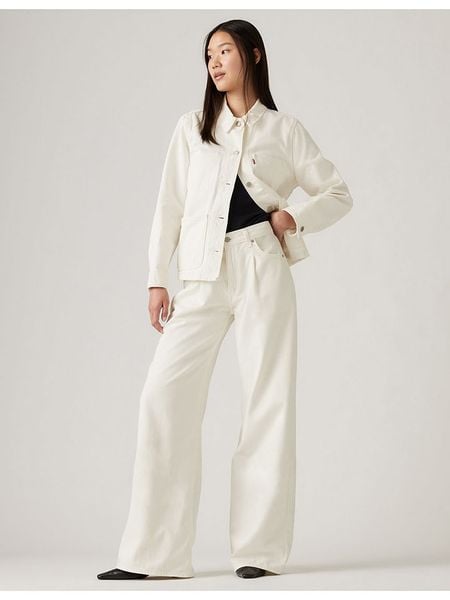 Levi's Dżinsy - Comfort fit - w kolorze kremowym rozmiar: W31/L32. Brązowe jeansy Levi's®, z aplikacjami. Za 206,91 zł.