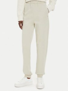 Calvin Klein Jeans Spodnie dresowe J20J224443 Beżowy Regular Fit. Brązowe spodnie dresowe Calvin Klein Jeans, m, bez wzorów, z bawełny. Za 289,99 zł.