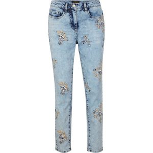 Dżinsy Slim Fit z kwiatowym haftem. Niebieskie jeansy bonprix, z aplikacjami, z jeansu. Za 199,99 zł.