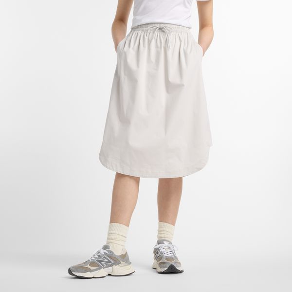Spódnica damska New Balance WK51551GYM – szara. Szare spódnice New Balance, m, bez wzorów, z bawełny, klasyczne, midi. Za 229,99 zł.