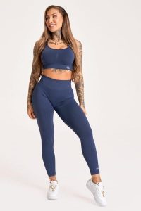 Legginsy fitness damskie Gym Glamour push up 2.0. Szare legginsy GYM GLAMOUR, bez wzorów, z materiału, z obniżonym stanem. Za 169,99 zł.