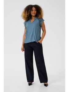 Cream Bluzka w kolorze błękitnym rozmiar: 40. Niebieskie bluzki Cream, bez wzorów, z koronki, bez kołnierzyka, bez ramiączek. Za 86,99 zł.