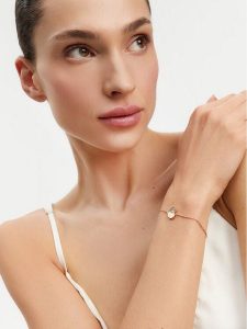 Guess Bransoletka Lovely Guess JUBB03 036JW Żółte złocenie. Żółte bransoletki Guess, metalowe. Za 129,99 zł.