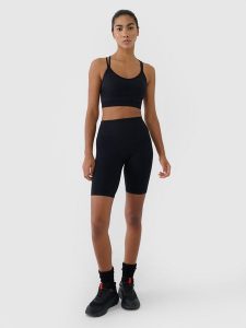 4F Legginsy kolarki bezszwowe treningowe damskie - czarne M/L. Czarne legginsy 4f, bez wzorów, z dzianiny, z podwyższonym stanem, krótkie. W wyprzedaży za 99,99 zł.