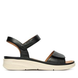 Sandały Josef Seibel. Czarne sandały Josef Seibel, bez wzorów, bez obcasa, na koturnie, bez zapięcia. Za 399,99 zł.