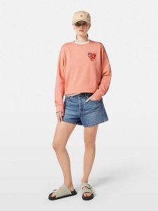 Scotch & Soda Bluza w kolorze brzoskwiniowym rozmiar: XS. Pomarańczowe bluzy Scotch & Soda, xs, bez wzorów, z bawełny, bez kaptura. Za 139,87 zł.