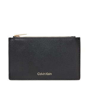 Portfel Calvin Klein. Czarne portfele Calvin Klein, bez wzorów. Za 189,99 zł.