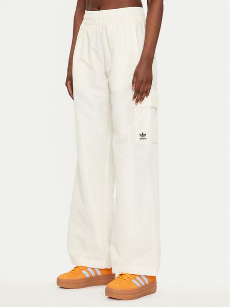 Adidas Spodnie dresowe Essentials Woven Cargo IX9970 Écru Loose Fit. Spodnie dresowe ADIDAS, m, bez wzorów, z dresówki. Za 179,99 zł.