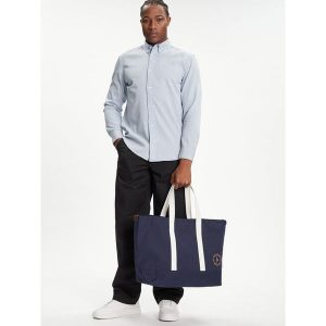 Torebka Tommy Hilfiger. Niebieskie shopper bag TOMMY HILFIGER, bez wzorów, bez dodatków. Za 269,99 zł.