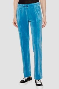 JUICY COUTURE Niebieskie damskie spodnie z cyrkoniami Tina, Rozmiar M. Niebieskie spodnie dresowe Juicy Couture, m, bez wzorów, z dresówki. Za 399,99 zł.