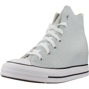 Buty CONVERSE CHUCK TAYLOR ALL STAR WEDGE Niebieski. Niebieskie trampki Converse, bez wzorów, z tkaniny, bez zapięcia. Za 368,99 zł.