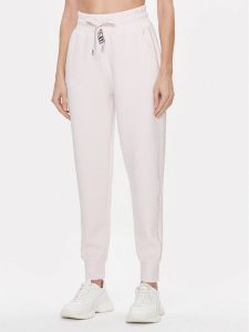 Guess Spodnie dresowe Logo W4RB46 KBYE2 Różowy Regular Fit. Czerwone spodnie dresowe Guess, xxl, z aplikacjami, z dresówki. Za 269,99 zł.