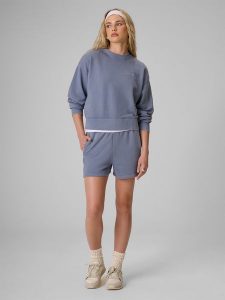 4F Spodenki dresowe damskie - denim XS. Niebieskie szorty 4f, bez wzorów, z denimu. Za 89,99 zł.