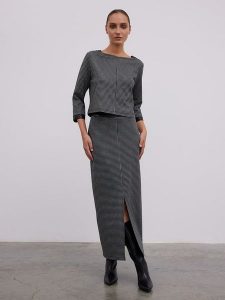 BGN Bluzka w kolorze szarym rozmiar: 38. Szare bluzki BGN, bez wzorów, ze skóry, bez kołnierzyka, bez ramiączek. Za 86,99 zł.