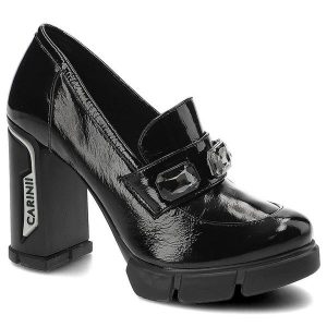 Czarne Półbuty Carinii Eleganckie Skórzane Buty Damskie. Czarne półbuty Carinii, z aplikacjami, ze skóry, bez obcasa, na słupku, bez zapięcia. Za 429,00 zł.