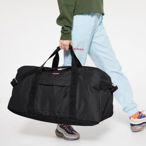 Torba podróżna Eastpak Terminal Plus. Czarne torby podróżne i sportowe Eastpak, bez wzorów, z materiału, na ramię. Za 291,60 zł.