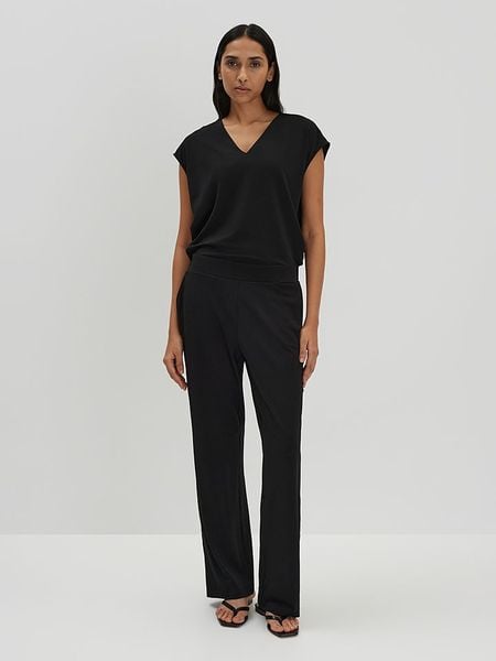 Someday Kombinezon w kolorze czarnym rozmiar: 38. Czarne kombinezony someday., bez wzorów, bez kołnierzyka, bez ramiączek. Za 281,76 zł.