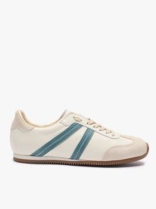 Kremowe półbuty sportowe z turkusowym paskiem. Brązowe półbuty Ryłko, bez wzorów, ze skóry, z okrągłym noskiem, bez obcasa, na płaskiej podeszwie, bez zapięcia. Za 449,99 zł.