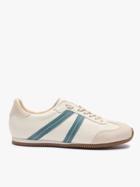 Kremowe półbuty sportowe z turkusowym paskiem. Brązowe półbuty Ryłko, bez wzorów, ze skóry, z okrągłym noskiem, bez obcasa, na płaskiej podeszwie, bez zapięcia. Za 449,99 zł.