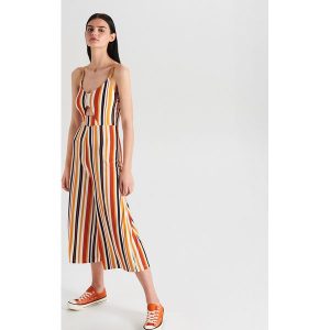 Wzorzysty kombinezon z wycięciem - Biały. Kombinezony marki Cropp. Za 79,99 zł.