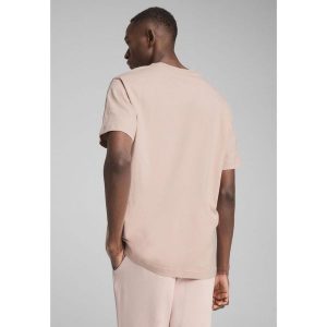 Koszulka unisex Essentials Elevated PUMA Rose Quartz Pink. Czerwone koszulki sportowe Puma, bez wzorów, z materiału, bez ramiączek. Za 109,00 zł.