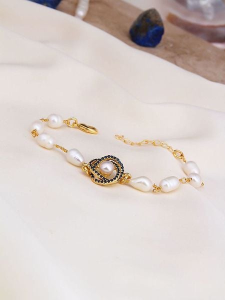 L'Atelier de Gaia Pozłacana bransoletka z elementami ozdobnymi rozmiar: onesize. Białe bransoletki L'Atelier de Gaia, z cyrkonią, pozłacane. Za 78,47 zł.