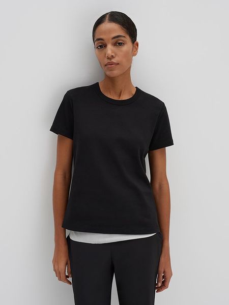 Someday Koszulka w kolorze czarnym rozmiar: 40. Czarne bluzki someday., bez wzorów, z bawełny, bez kołnierzyka, bez ramiączek. Za 82,83 zł.