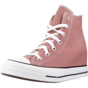 Buty CONVERSE CHUCK TAYLOR ALL STAR WEDGE Czerwony. Czerwone buty sportowe Converse, bez wzorów, bez zapięcia. Za 368,99 zł.