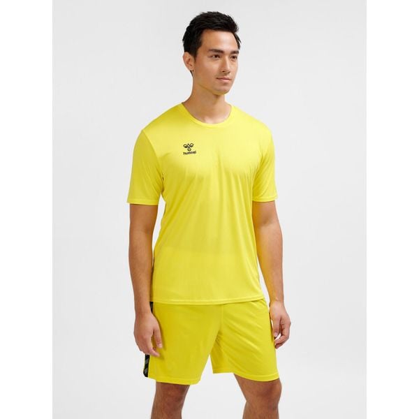 Niezbędna koszulka Hummel. Żółte bluzki Hummel, bez wzorów, sportowe, bez kołnierzyka, bez ramiączek. Za 119,50 zł.