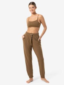 Super.natural Spodnie dresowe "Solution" w kolorze jasnobrązowym rozmiar: M. Brązowe spodnie dresowe super.natural, m, bez wzorów, z dresówki. Za 260,99 zł.