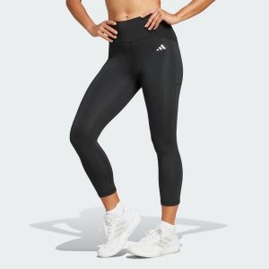 Legginsy Optime Essentials Stash 3/4. Czarne legginsy ADIDAS, bez wzorów, z materiału. Za 179,00 zł.