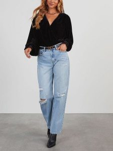 Milan Kiss Bluzka w kolorze czarnym rozmiar: M. Czarne bluzki Milan Kiss, m, bez wzorów, bez kołnierzyka, bez ramiączek. Za 148,61 zł.