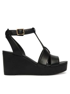 Clarks Sandały Sabina Hope 26186102 Czarny. Czarne sandały Clarks, bez wzorów, ze skóry, bez obcasa, na koturnie, bez zapięcia. Za 469,99 zł.