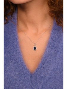 CARATELLI Złota zawieszka "Soleil Bleu" z kamieniami szlachetnymi rozmiar: onesize. Niebieskie zawieszki CARATELLI, z szafirem, złote. Za 1 304,99 zł.