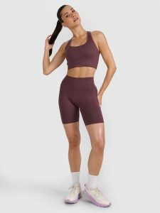 4F Legginsy kolarki treningowe bezszwowe damskie - brązowe XS/S. Brązowe legginsy 4f, bez wzorów, z dzianiny, z podwyższonym stanem. Za 119,99 zł.