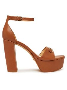 Guess Sandały FLJSET LEA03 Brązowy. Brązowe sandały Guess, z aplikacjami, ze skóry, bez obcasa, na słupku, bez zapięcia. Za 499,99 zł.