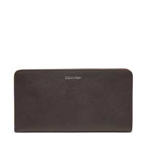Portfel Calvin Klein. Brązowe portfele Calvin Klein, bez wzorów. Za 289,99 zł.